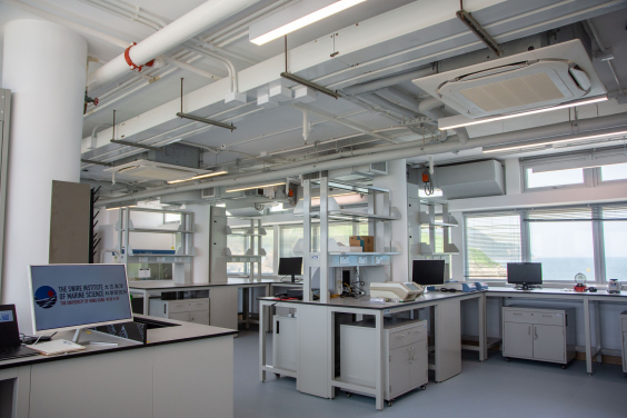 Image 7: Molecular Laboratory - What used to be staff offices and storage space has been converted into a brand new, state of the art molecular lab. It provides a highly sterilised and dry environment for extracting DNA of specimens and performing downstream molecular analysis using advanced equipment.